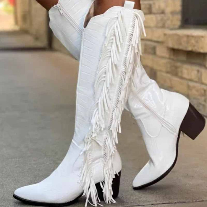Stylish women's fringe cowgirl boots in white with a pointed toe and decorative fringe detail