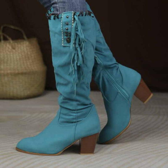 Stylish women's knee high cowgirl boots in turquoise with fringe and button details