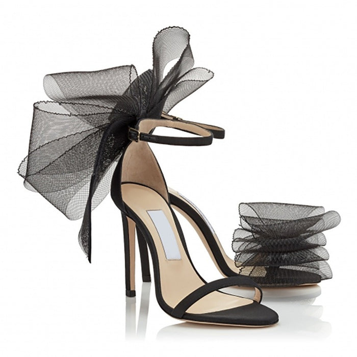Women's lace up stiletto party sandals with decorative tulle bow for stylish events