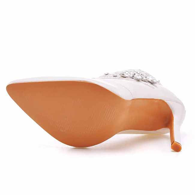 Elegant women's lace wedding boots with a decorative design and pointed toe for stylish bridal footwear