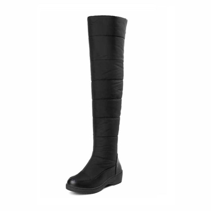 Womens over the knee snow boots with a stylish padded design for winter weather
