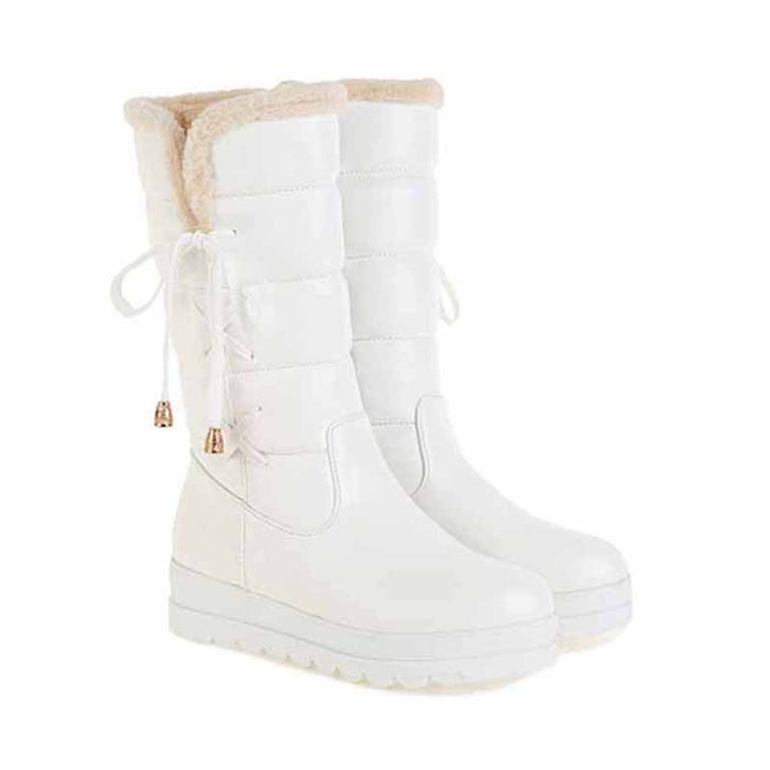 Women's waterproof winter boots in white with faux fur lining and adjustable laces