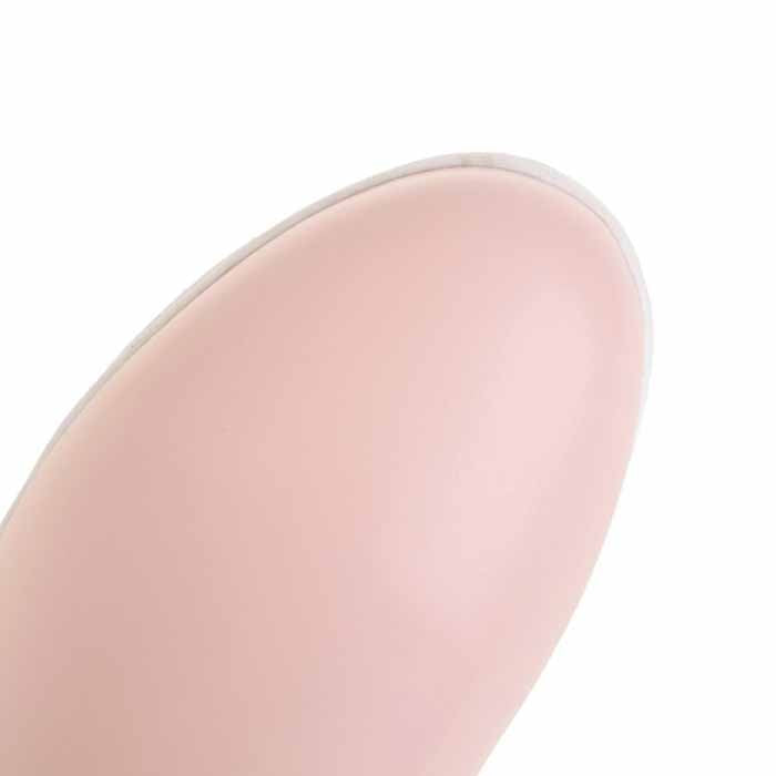 Close-up of women's waterproof winter boots with a smooth pink upper for cold and wet conditions